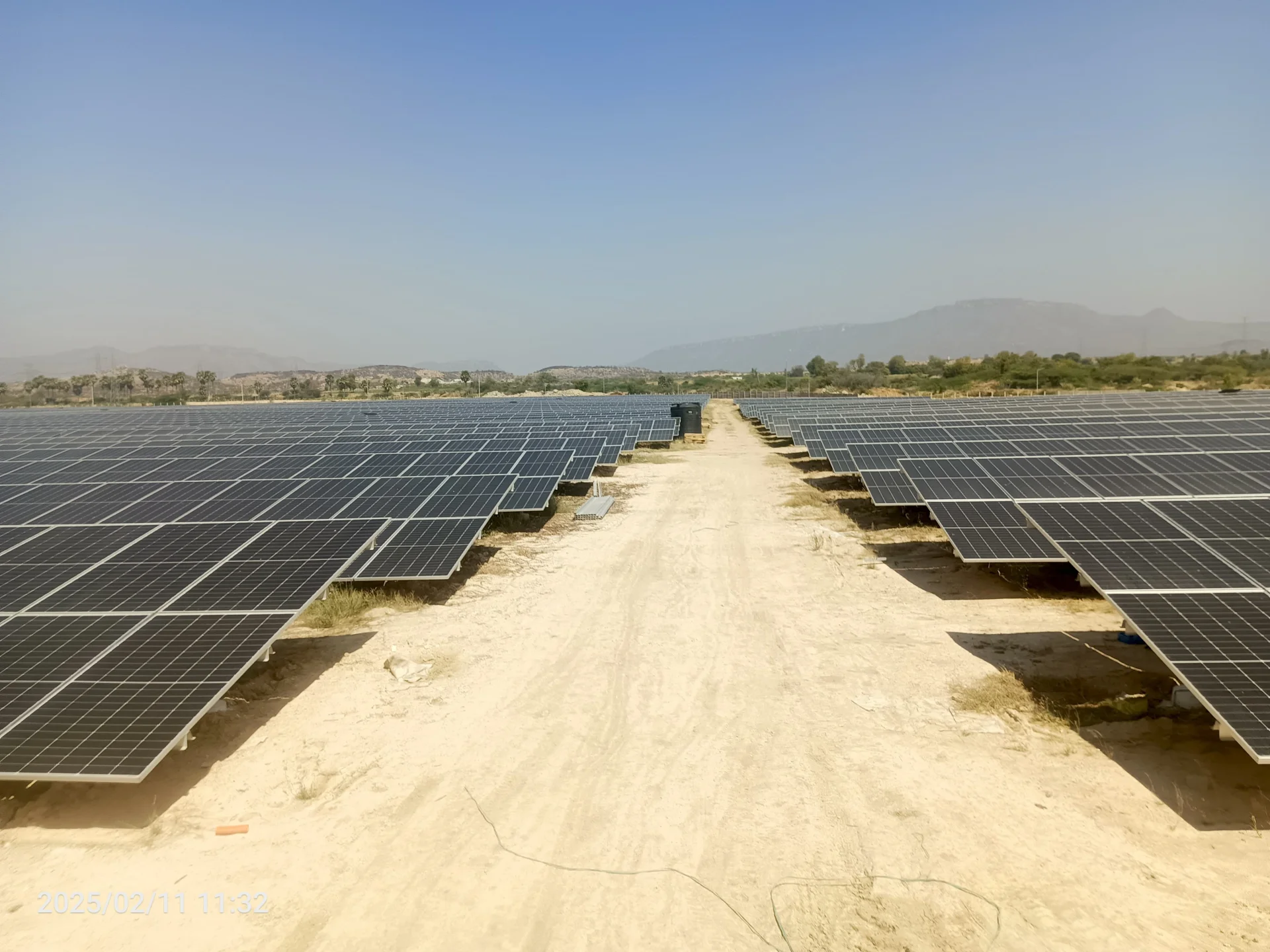 Workers installing solar panels